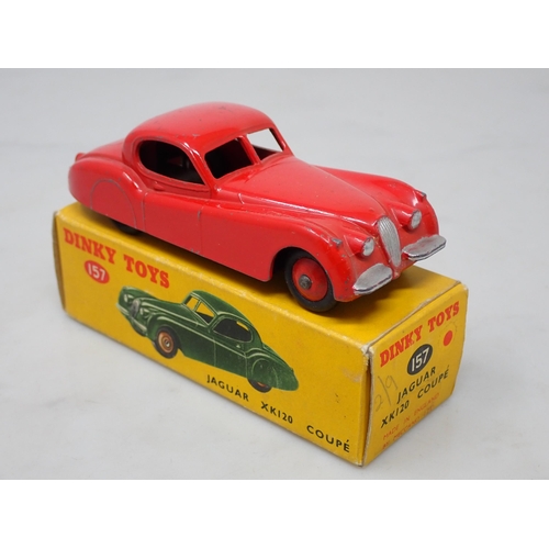 384 - A boxed Dinky Toys No.157 red Jaguar XK120 Coupe