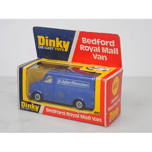 385 - A boxed Dinky Toys No.612 Commando Jeep and two boxed No.410 Bedford Vans