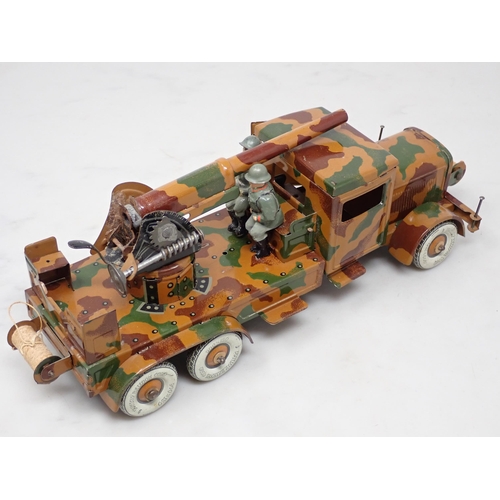 396 - A tinplate Tipp & Co. clockwork 6-wheel German Lorry with anti-aircraft Gun and two composite Figure... 