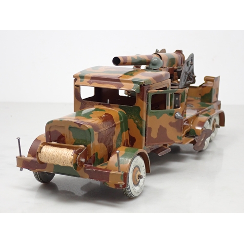 396 - A tinplate Tipp & Co. clockwork 6-wheel German Lorry with anti-aircraft Gun and two composite Figure... 