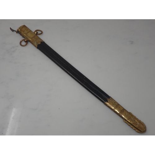 705 - A First World War Naval Dirk by Gieves with clean etched blade in brass mounted leather Scabbard, en... 