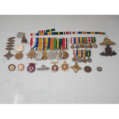 712 - A Group of Medals comprising 1914-15 Star, War Medal, Defence Medal, Territorial Efficiency Decorati... 