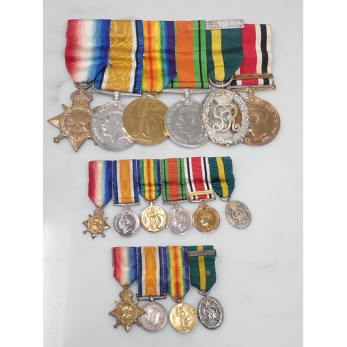 712 - A Group of Medals comprising 1914-15 Star, War Medal, Defence Medal, Territorial Efficiency Decorati... 