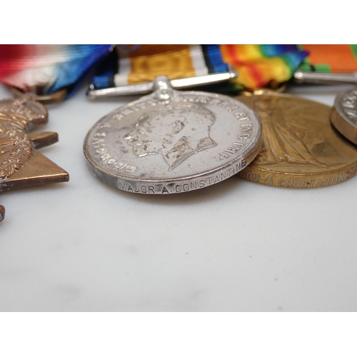 712 - A Group of Medals comprising 1914-15 Star, War Medal, Defence Medal, Territorial Efficiency Decorati... 