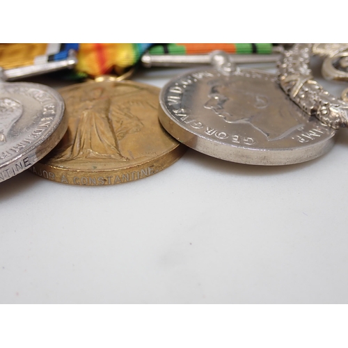 712 - A Group of Medals comprising 1914-15 Star, War Medal, Defence Medal, Territorial Efficiency Decorati... 