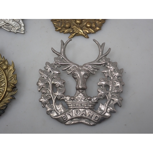 737A - Two Argyll & Sutherland Highlanders Cap Badges, a 93rd Sutherland Highlanders Cap Badge and another ... 