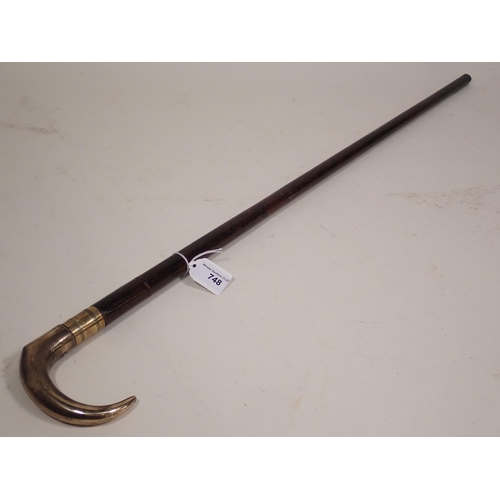 748 - A de-activated Walking Stick Gun with brass handle and no operating parts