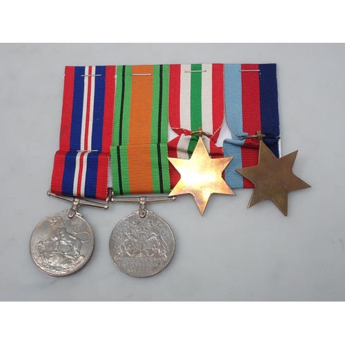 763 - A Medal Group compising 1939-45 Star, Italy Star, Defence and War Medal with condolence slip to 2930... 