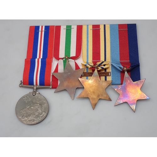 764 - Medal Group comprising 1939-45, Africa Star, Italy Star and War Medal to 2985600 Sgt. Charles Blackb... 