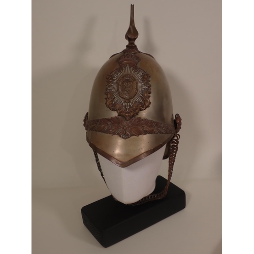 799 - A white metal Spike Helmet of Shropshire Imperial Yeomanry, also Tunic and Trews, two peaked Caps an... 