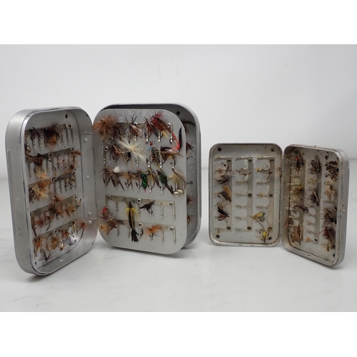 812 - Five Wheatley and unnamed alloy Fly Tins including assorted trout Flies, an alloy circular Rig Tin a... 