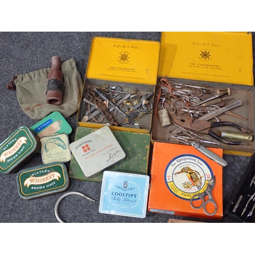 823 - Two boxes of Fishing items including Shakespeare Sigma Fixed Spool Reel, Abu Ambassadeur Multiplier ... 