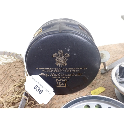 836 - A Hardy Marquis Salmon No1 Fly Reel in zip case, and two spare Spools, a Hardy's Folding Landing Net... 