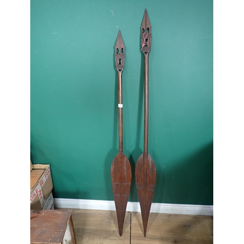 852 - Two carved hardwood Benin Ceremonial Paddles 5ft 1in L and 5ft 4in L