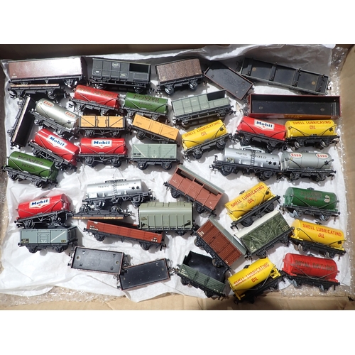 94 - A box including over forty unboxed Hornby-Dublo Wagons to include two early Royal Daylight Tankers a... 