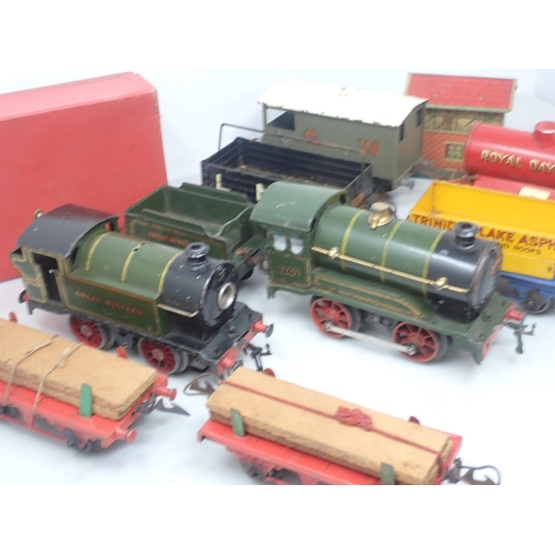 99 - A Hornby 0 gauge 20v G.W.R. Locomotive missing safety valve, a G.W.R. clockwork 0-4-0 Locomotive and... 