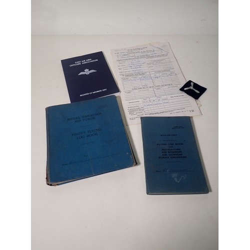 753 - A collection of RA.F. training Exercise Books and Manuals, also two Pilot's Log Books (one Canadian ... 