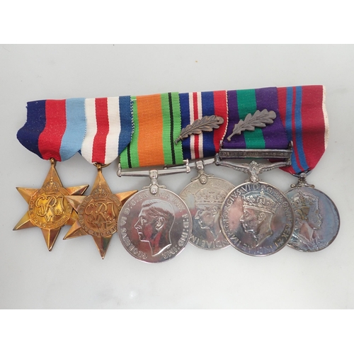 712A - A Second World War Medal Group awarded to Major R.M. Allen O.B.E., Norfolk Regiment (later Colonel A... 