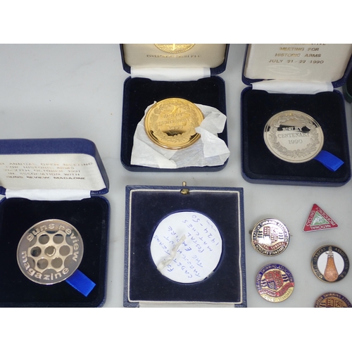 720 - A collection of Medallions to include National Rifle Association, Bisley Centenary, George IV Corona... 