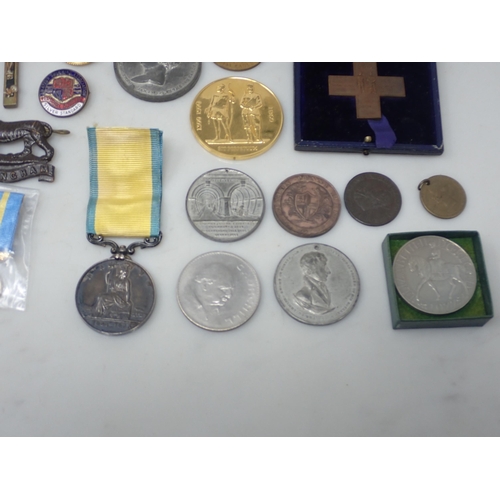 720 - A collection of Medallions to include National Rifle Association, Bisley Centenary, George IV Corona... 