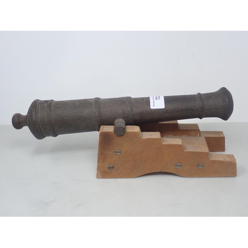 722 - An early 19th Century Signalling Cannon, barrel 13in L (pitted overall), a model Carronade and two d... 