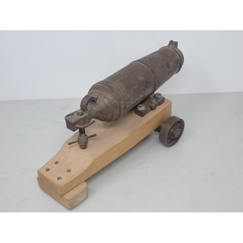 722 - An early 19th Century Signalling Cannon, barrel 13in L (pitted overall), a model Carronade and two d... 