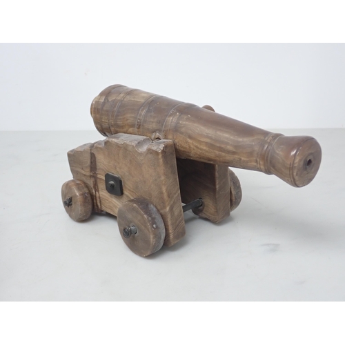 722 - An early 19th Century Signalling Cannon, barrel 13in L (pitted overall), a model Carronade and two d... 