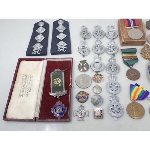 754 - A number of anodized Police Badges and Numerals, assorted Medallions, etc.