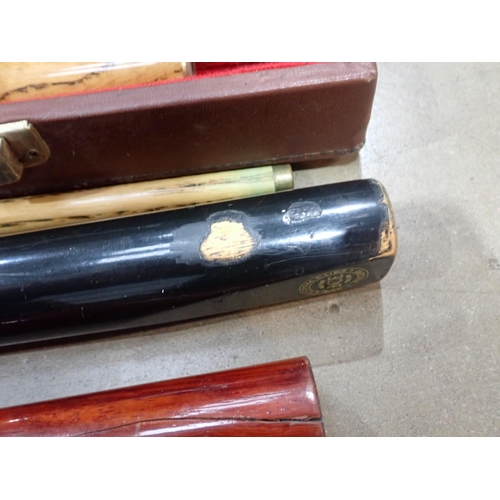 862 - Five Snooker Cues including Jaguar and Victory