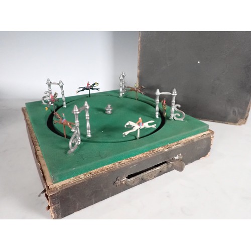 560 - A mechanical Horse Racing Game with horses being spring driven, maker initials 