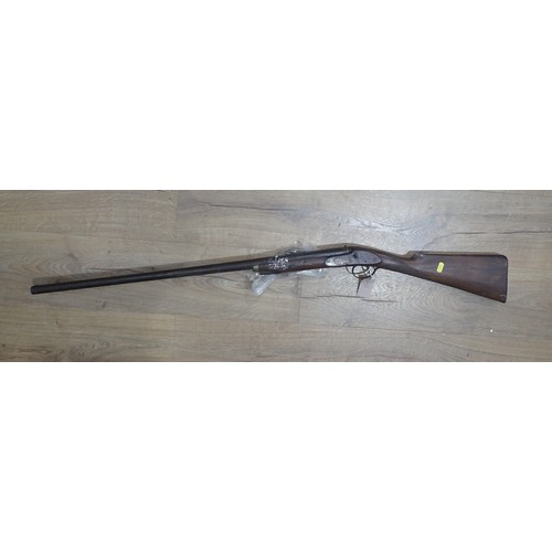 755 - A percussion single barrel Shotgun, ramrod rib missing A/F, a small Continental Flintlock Pistol A/F... 