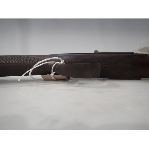 755 - A percussion single barrel Shotgun, ramrod rib missing A/F, a small Continental Flintlock Pistol A/F... 