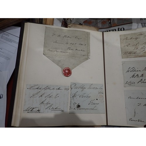 561 - A Victorian Album bearing name of Haughton, Falmouth on frontis, with early 19th century Postmarks f... 