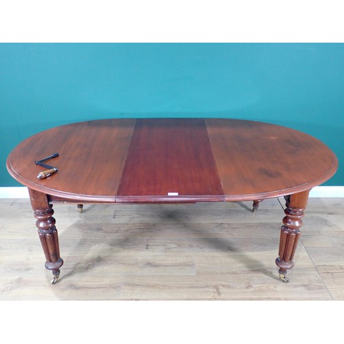 22 - A Victorian mahogany D-end extending Dining Table with wind out action, winder and spare leaf mounte... 