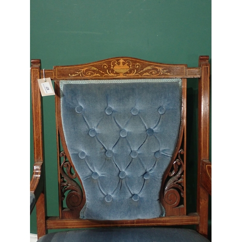 435 - A pair of Edwardian inlaid Armchairs with button upholstered backs on turned front supports and cast... 