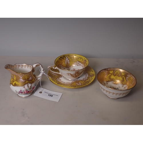 100 - A Royal Worcester Cup, Saucer, Jug and Bowl, floral painted with yellow and gilt surround, hair crac... 