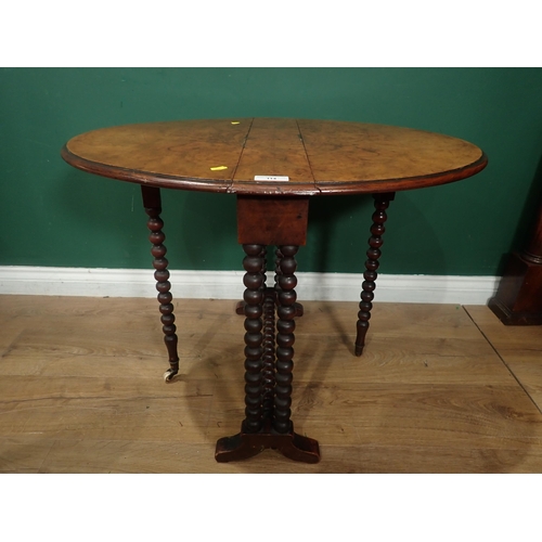 114 - A Victorian walnut Sutherland Table on bobbin turned supports 2ft W x 2ft H