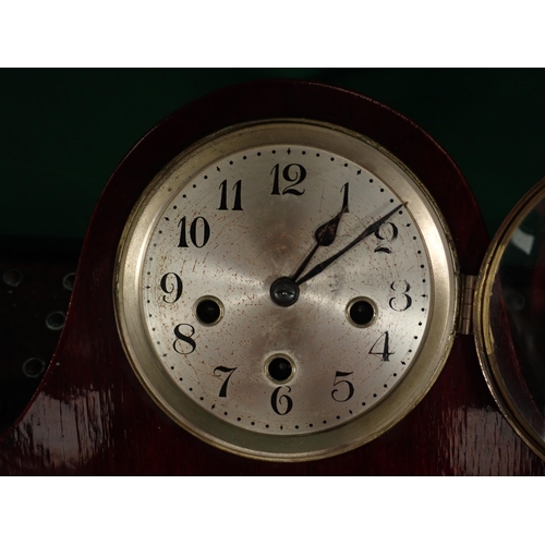 128 - A mahogany Mantel Clock