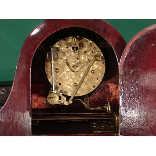 128 - A mahogany Mantel Clock