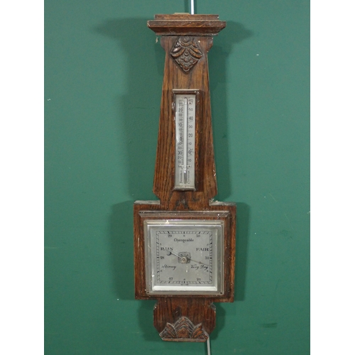 131 - A Chinese blue and white Stick Stand and an oak aneroid Barometer