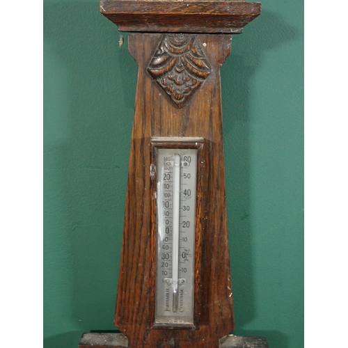 131 - A Chinese blue and white Stick Stand and an oak aneroid Barometer