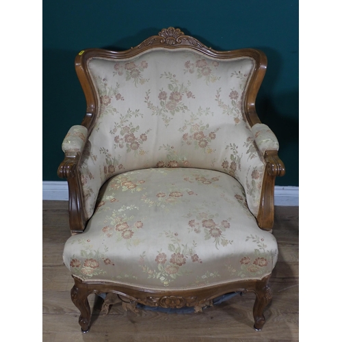 14 - A reproduction walnut fold-over Card Table and a French style upholstered Armchair