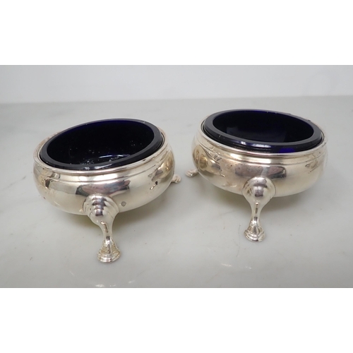 148 - A pair of George III silver Salts with blue glass liners, on hoof feet, London 1769, a plated Coffee... 