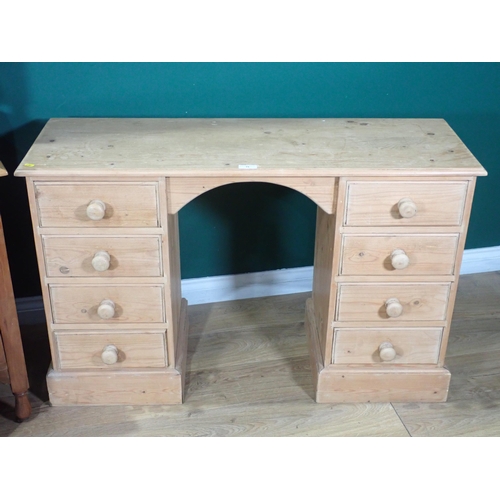 15 - A pine Desk fitted eight drawers on plinth base 3ft 11in W and a walnut Dressing Chest, 3ft 6in W