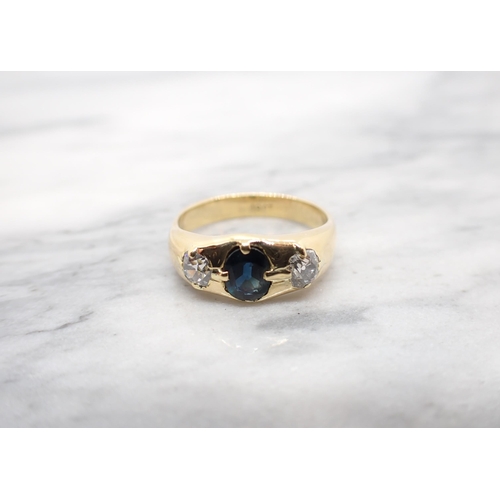 160 - A Sapphire and Diamond three stone Ring claw-set oval-cut sapphire between two old-cut diamonds, sta... 