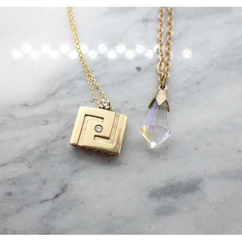 172 - A Diamond and Enamel Greek reversible Pendant on very fine chain in 18ct gold and a yellow metal Cha... 