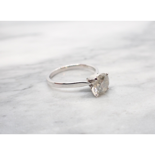 174 - A Diamond single stone Ring claw-set brilliant-cut stone in 18ct white gold, ring size M 1/2