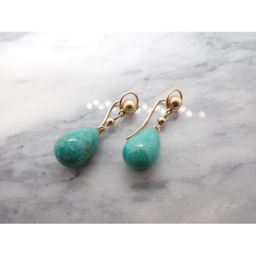 189 - A pair of Amazonite Earrings each suspending drop shaped stone from wire fitting