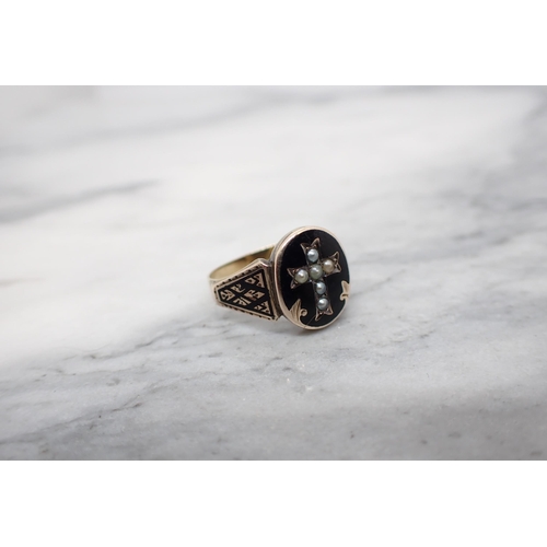 194 - A 19th Century Mourning Ring with seed pearl cross on black enamel, enclosing lock of hair, ring siz... 