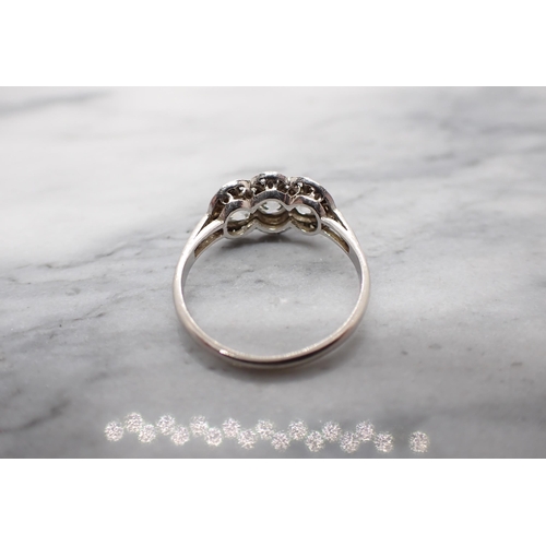 206 - A 1920's Diamond triple Cluster Ring set three old-cut stones within a frame of rose-cut stones, rin... 